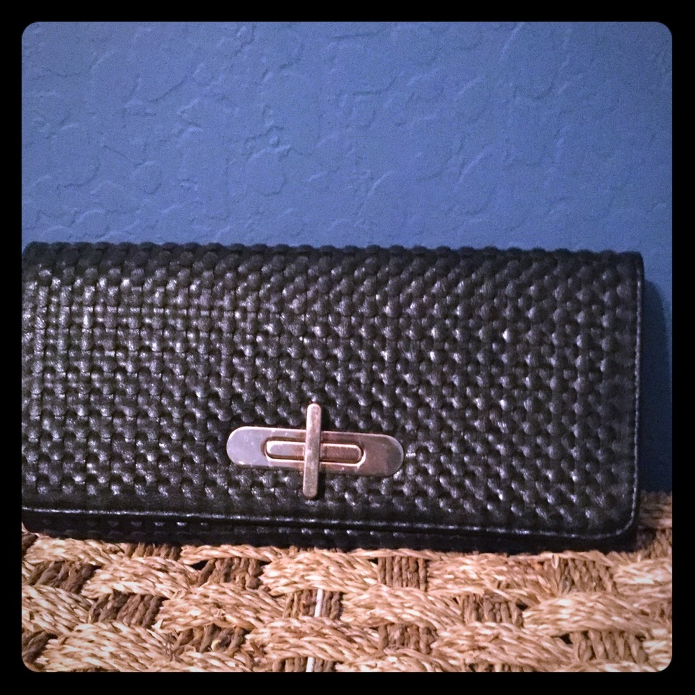 Large black faux leather clutch